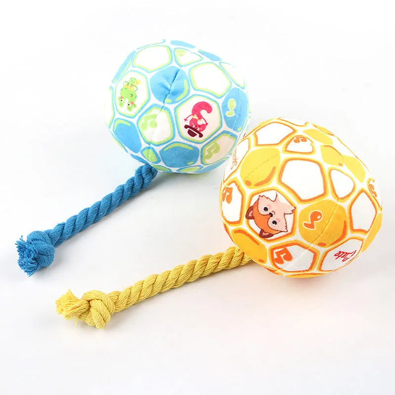 Bright coloured elastic football dog toy with cotton rope construction for tug of war and teeth grinding