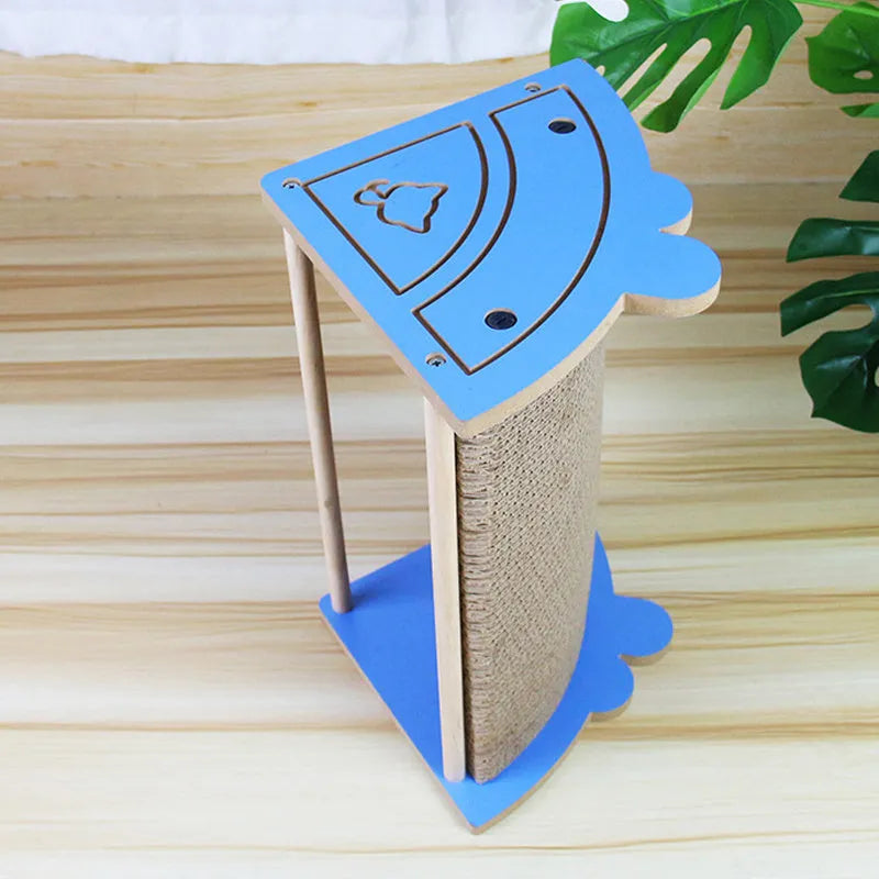 Grey cardboard cat corner scratcher with hanging ball against a wall