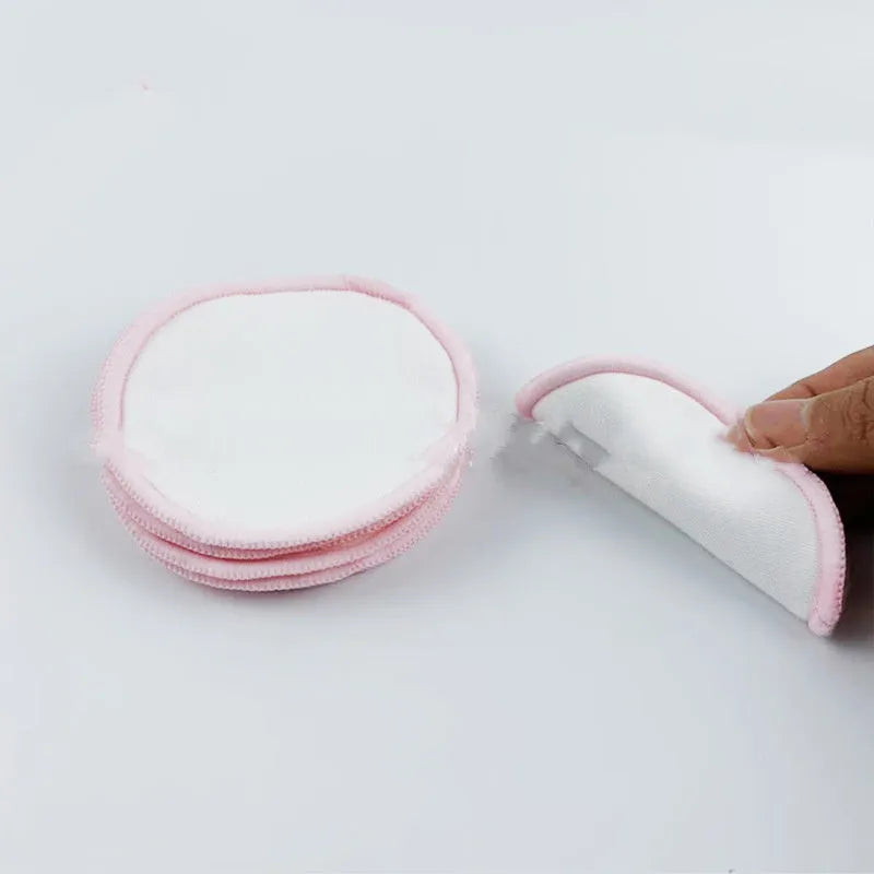 Set of red and blue velvet makeup remover pads with cotton mesh storage bag