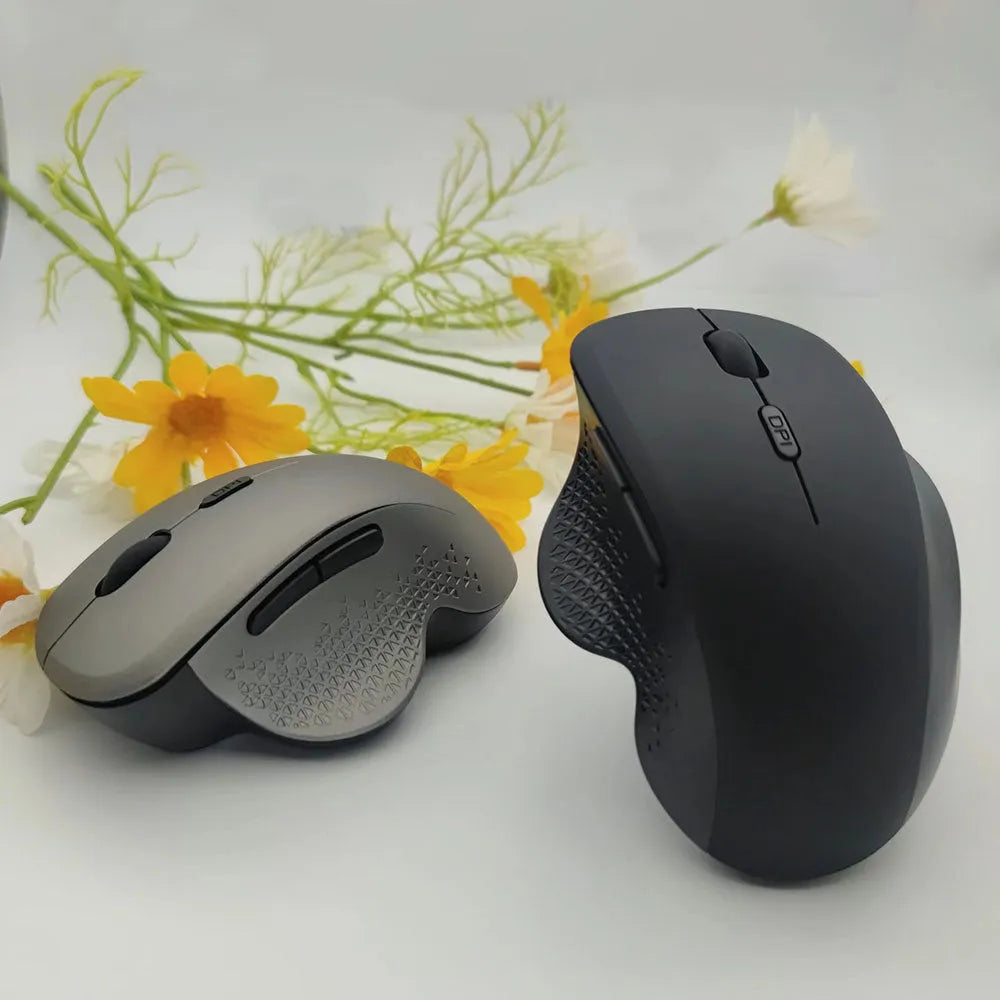 Black and grey wireless optical mouse for laptops with USB charging cable