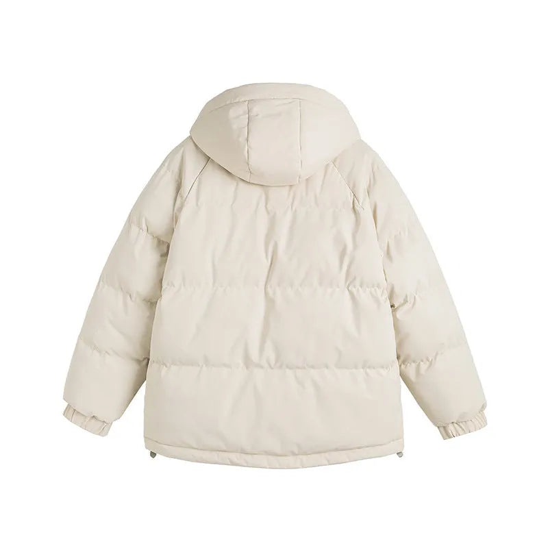 Loose fit fake two-piece winter coat in a solid colour with side seam pockets.