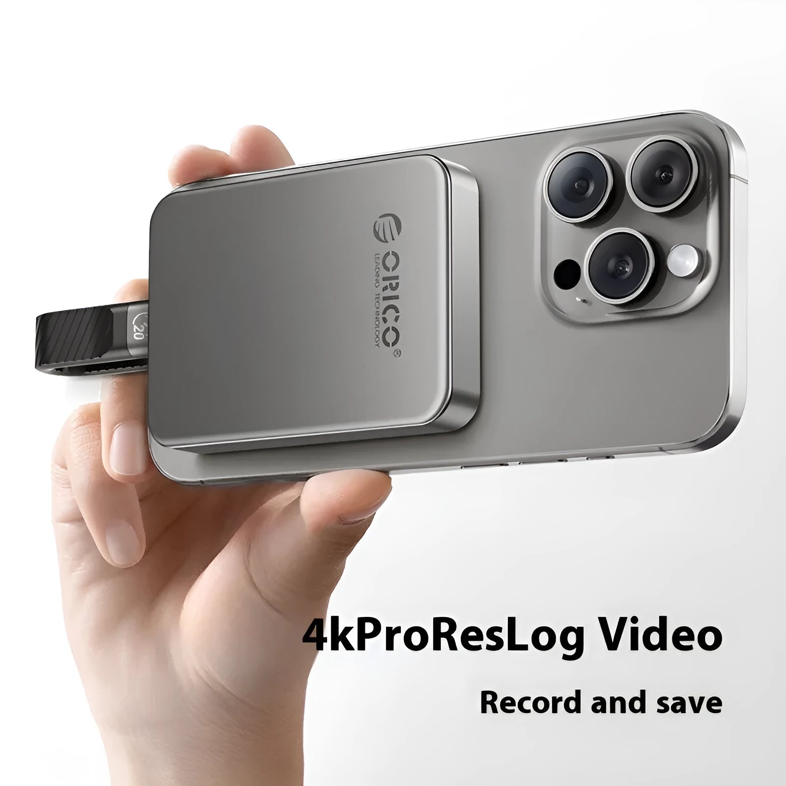 Grey magnetic mobile SSD with ultra-thin design and magnetic suction ring for portable storage expansion