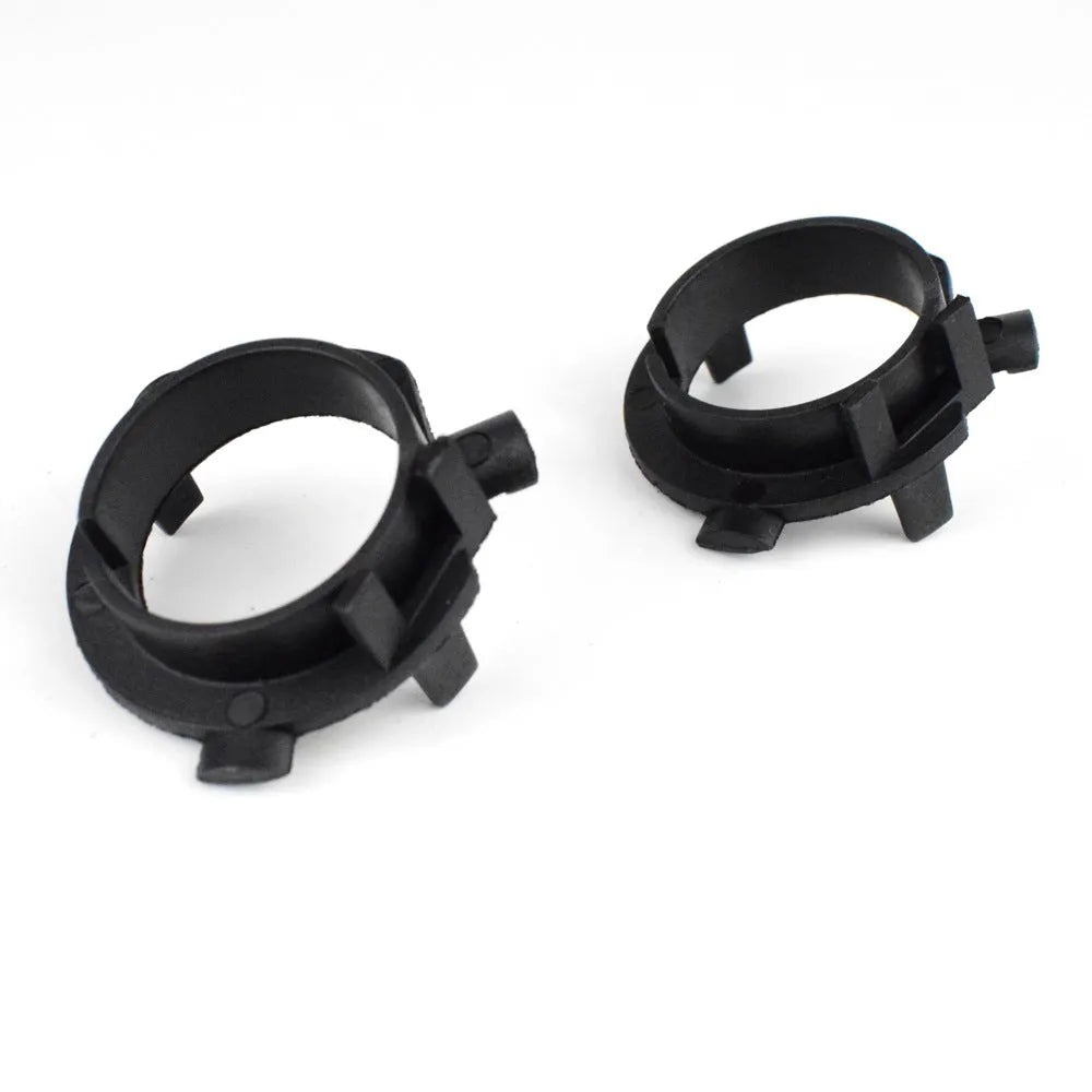 White ABS plastic car LED headlight card holder with dimensions 3.8cm by 3.7cm.