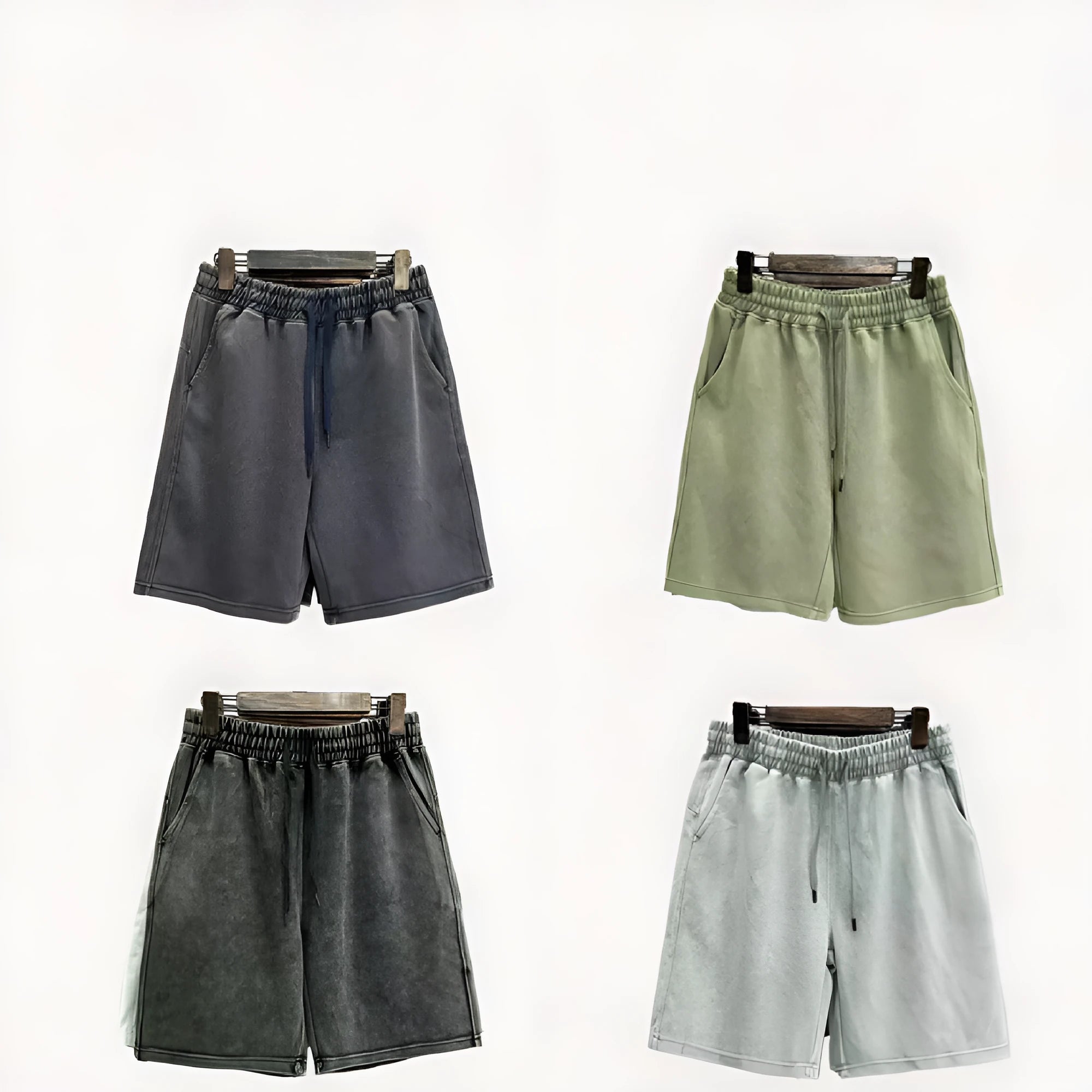 Men's cotton distressed shorts in loose straight-leg fit showing navy blue, mud lime, ash black and grass green colour options
