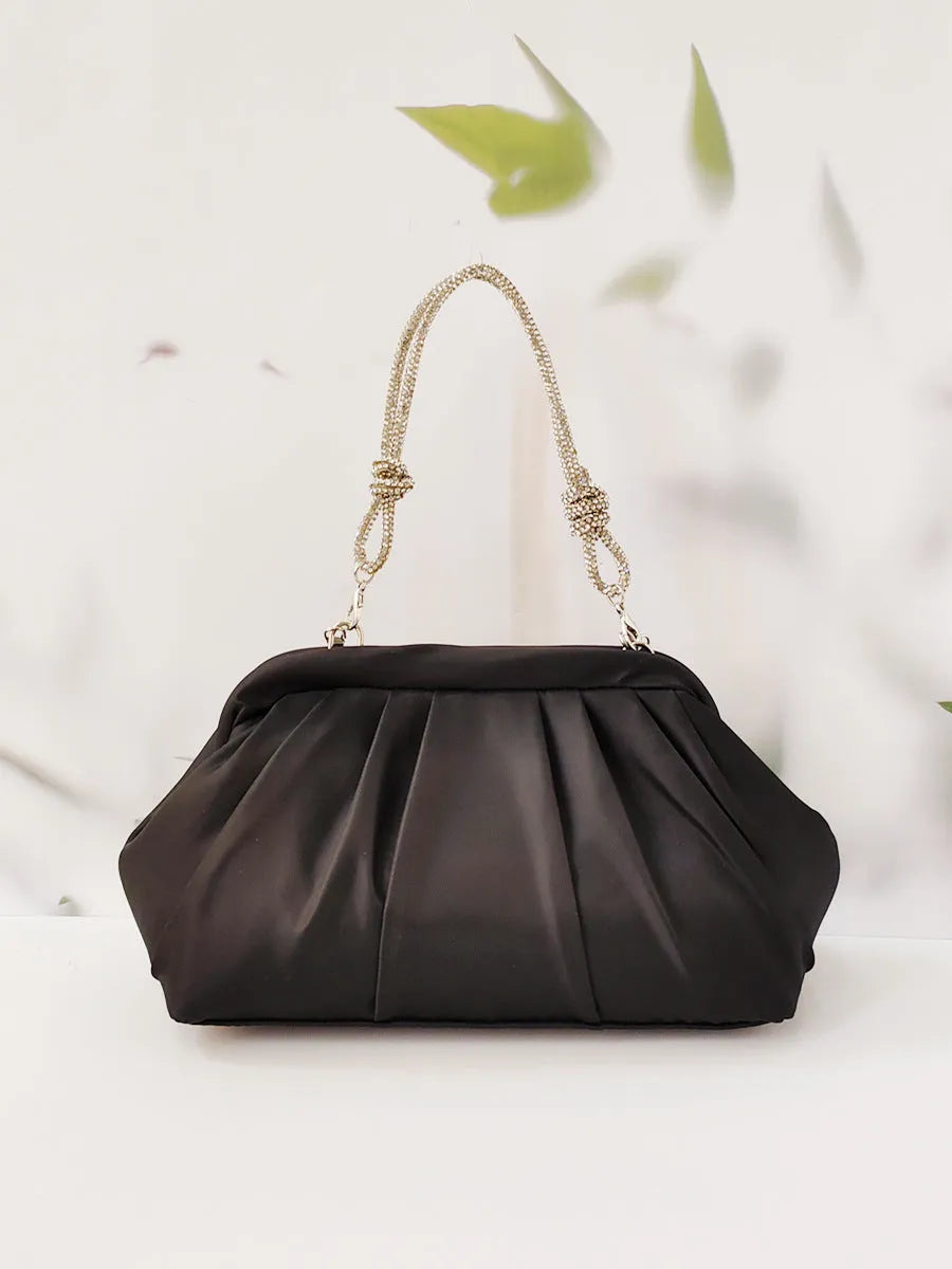 Women's soft polyester dinner bag with chain detailing, document compartment, and shell-shaped design in three colour options