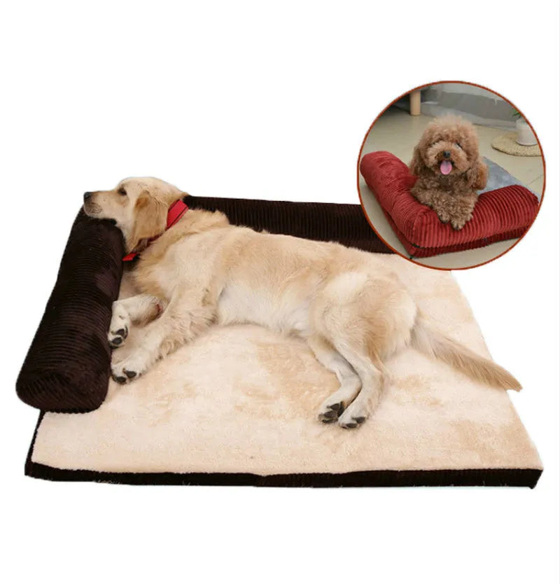 Corduroy dog sofa bed with bolster sides in a grey colour, shown on a wooden floor.