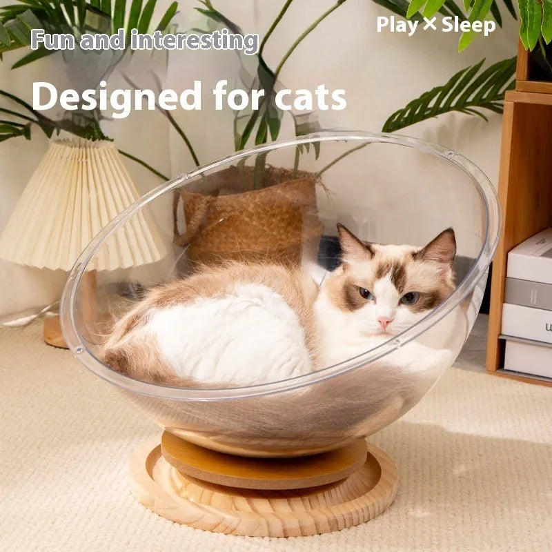 Transparent acrylic space capsule cat bed on turntable base with cat inside