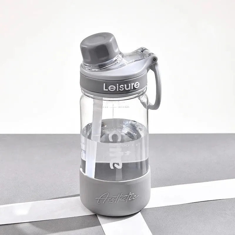 Grey plastic cup with cartoon pattern, heat-resistant and portable, 1000ml capacity.