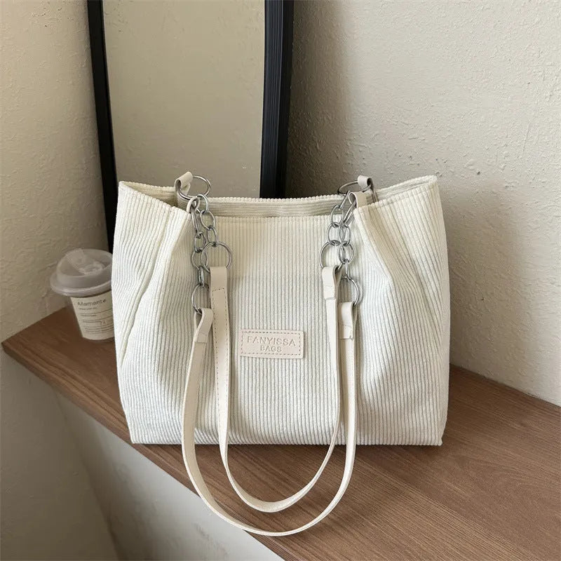 Corduroy one-shoulder tote handbag in street trend style with three-dimensional pocket