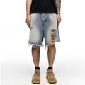 Men's light blue baggy denim shorts with a retro washed finish on a mid-waist