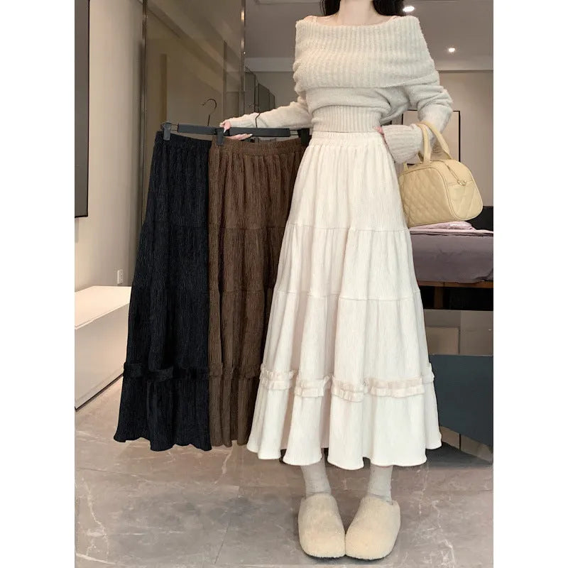 Women's corduroy A-line midi skirt with elastic waistband in beige, black or brown colours