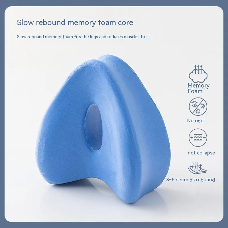 Love heart-shaped dark blue jacquard memory foam leg pillow for adult side sleepers.