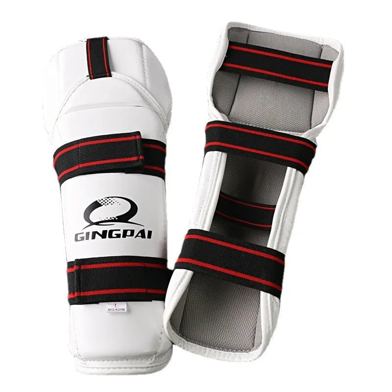 Taekwondo protective gear set showing arm guards, elbow protection and legguards in adjustable sizes