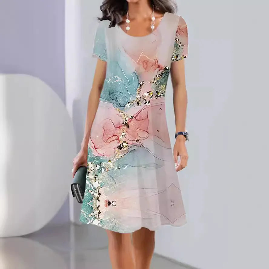 Light blue floral print summer dress with short sleeves and an A-line mid-length skirt on a hanger