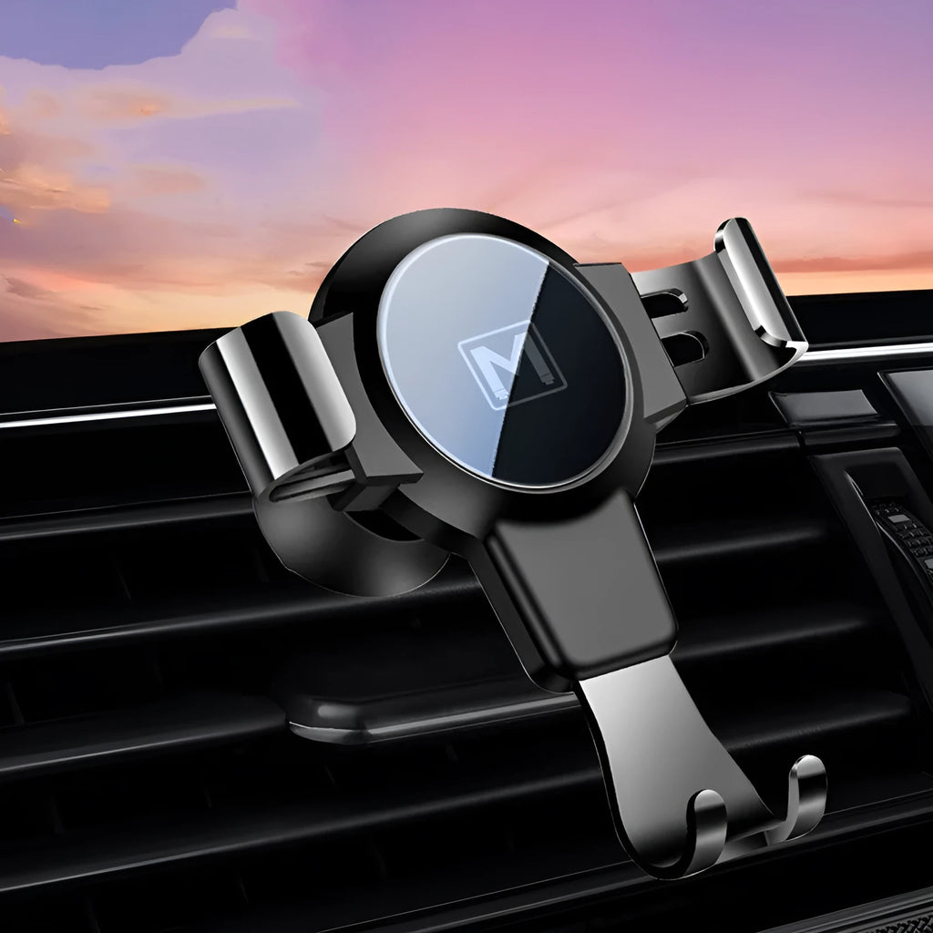 Black S4 gravity mirror ABS phone bracket clipped to a car air vent, holding a mobile phone.