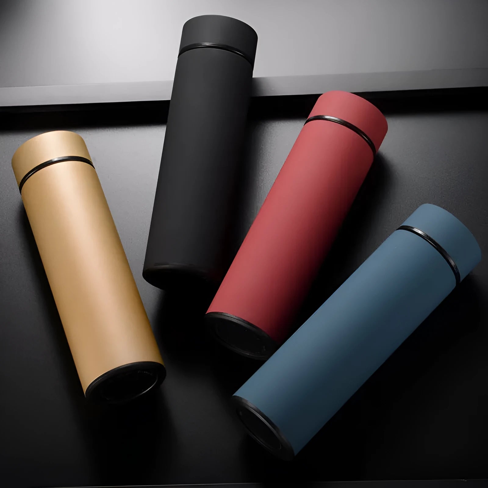 Black stainless steel vacuum water bottle with arrow-shaped mouth, 450ml capacity.