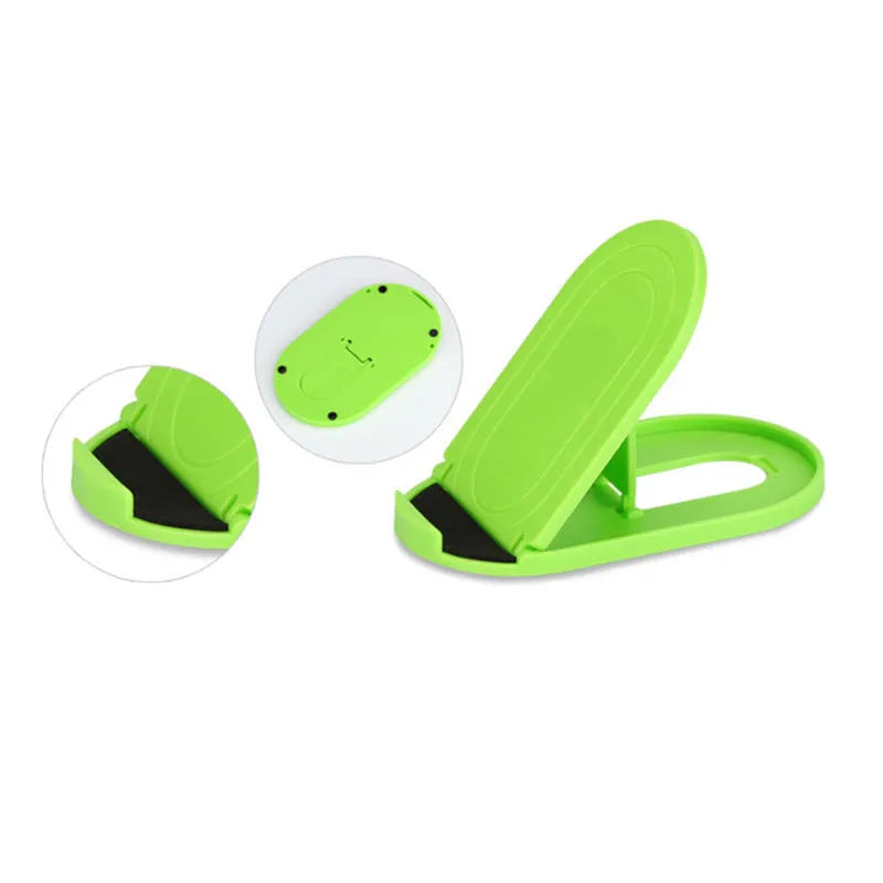Plastic mobile phone stand with lazy bracket, holding a smartphone, shown in multiple colour options.