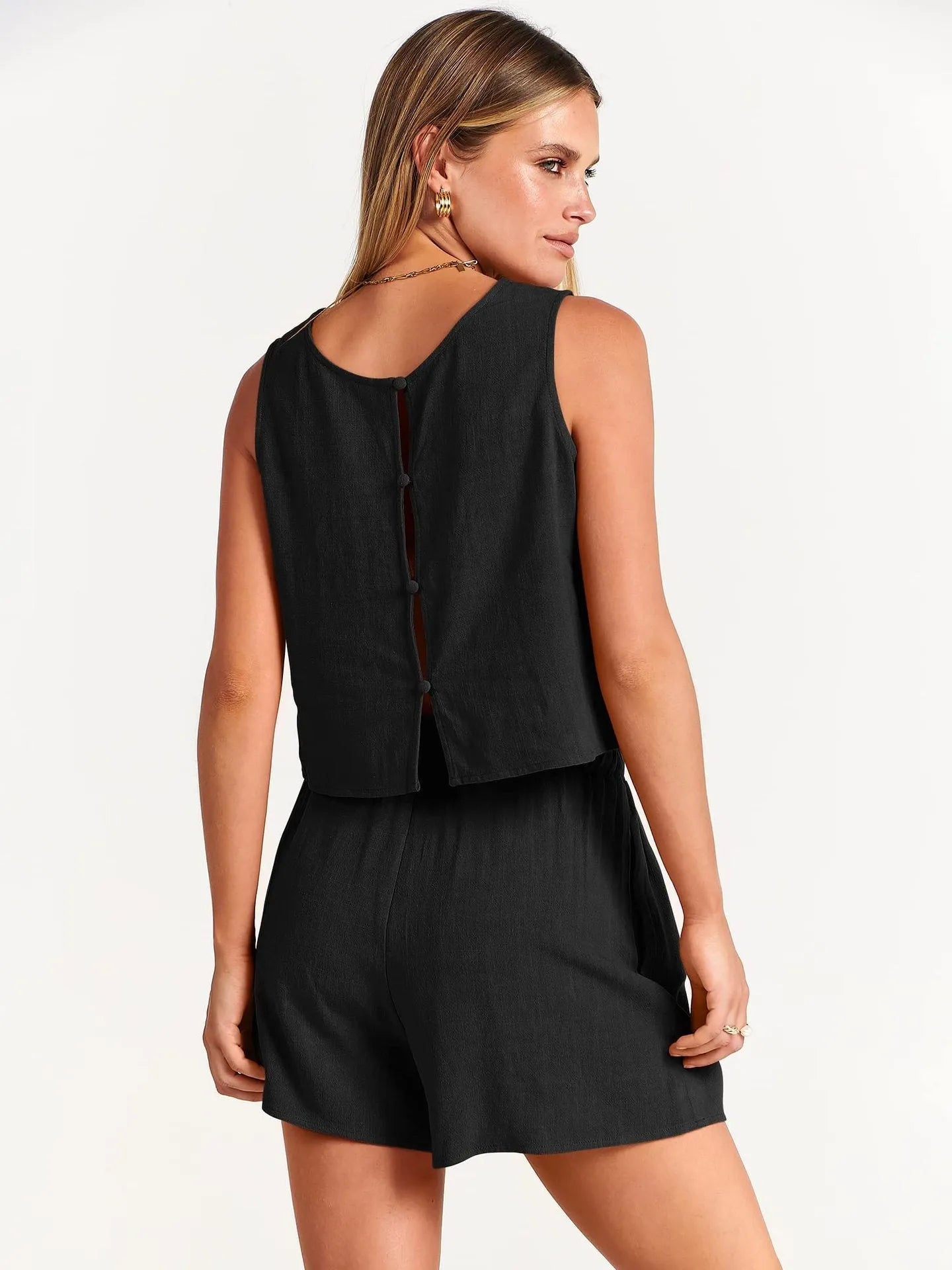 Women's sleeveless top and drawstring shorts summer outfit set in a solid colour.