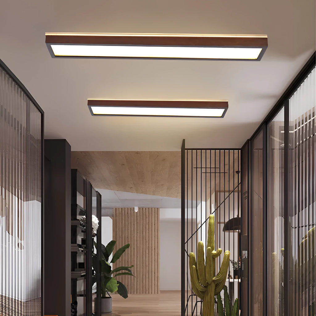 A long, linear solid wood ceiling lamp in New Chinese style, shown in a walnut finish, hanging from a covered balcony ceiling.