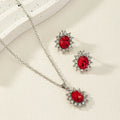 Women's sunflower motif alloy earring and necklace jewellery set in six colour options.