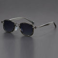 Retro square frame sunglasses with AC lenses in a black gold and grey colour combination.