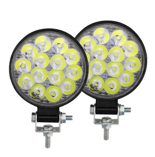 White aluminium mini round 42W LED work light with IP67 waterproof rating for vehicles and machinery.