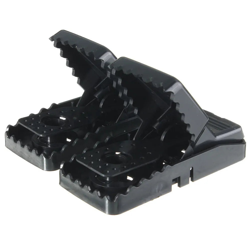 Six black snapping mousetraps made from alloy plastic with dimensions 11cm by 5cm