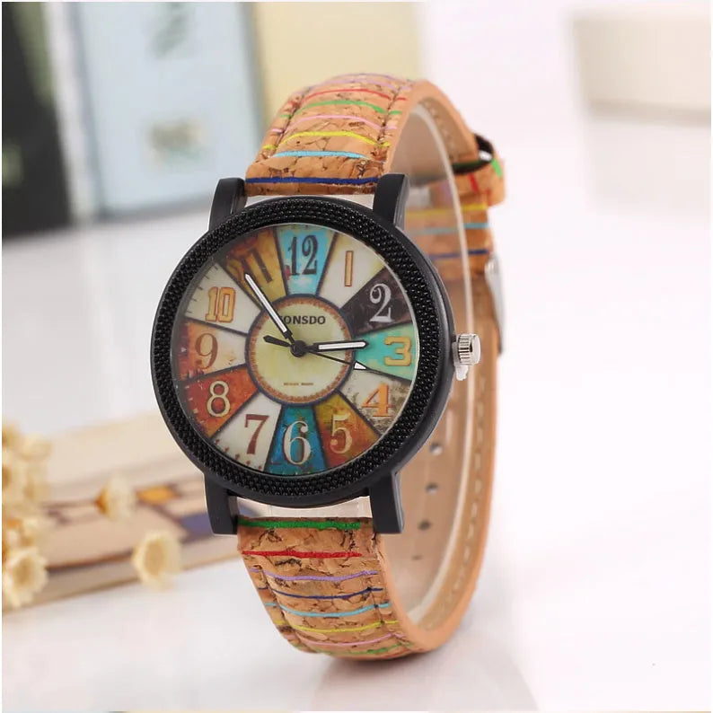 Women's vintage leather strap quartz watch with 37mm round dial and stainless steel buckle