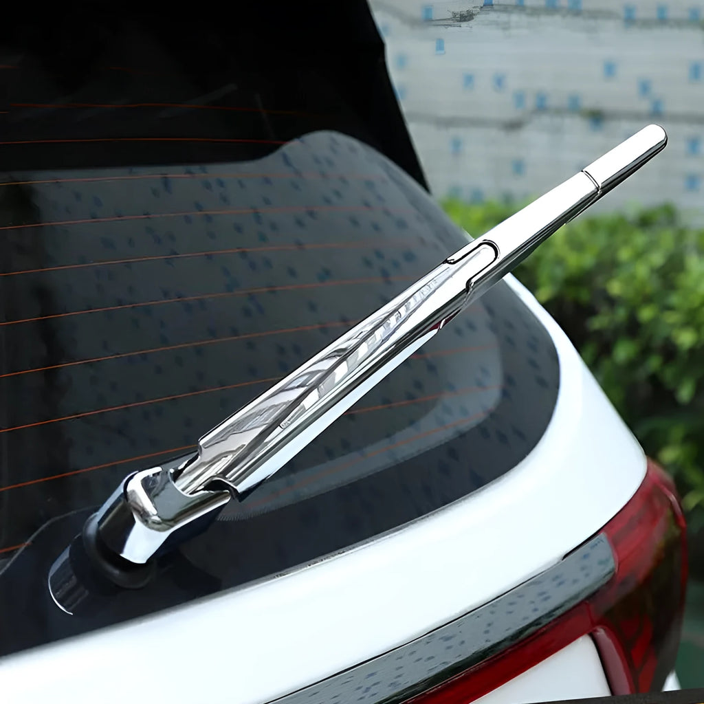 Set of four silvery ABS plastic rear window wiper cover trim strips for a 2010 Hyundai.