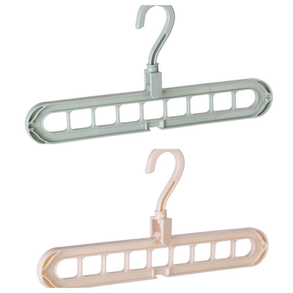 Plastic clothes hanger with a rotating hook in assorted colours on a white background.