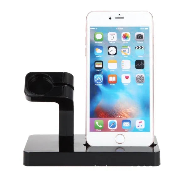 White 2-in-1 charging dock station holding an iPhone and an Apple Watch on a wooden desk.