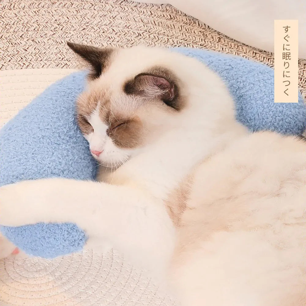 Blue U-shaped cat pillow with an adjustable fabric collar for neck support.