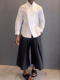 White asymmetric front long sleeve shirt with black pleated trousers casual set