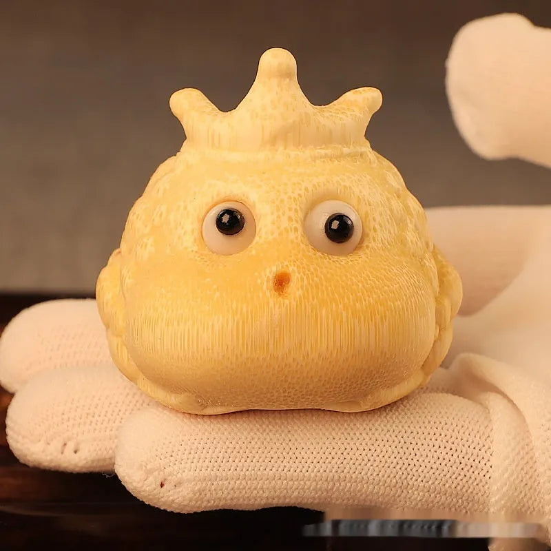 Hand-carved bamboo sculpture of a cute Crown Princess toad ornament.