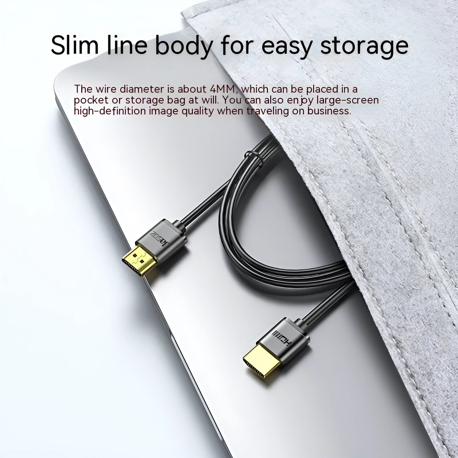 A thin, flexible HDMI cable with gold-plated connectors on a white background.