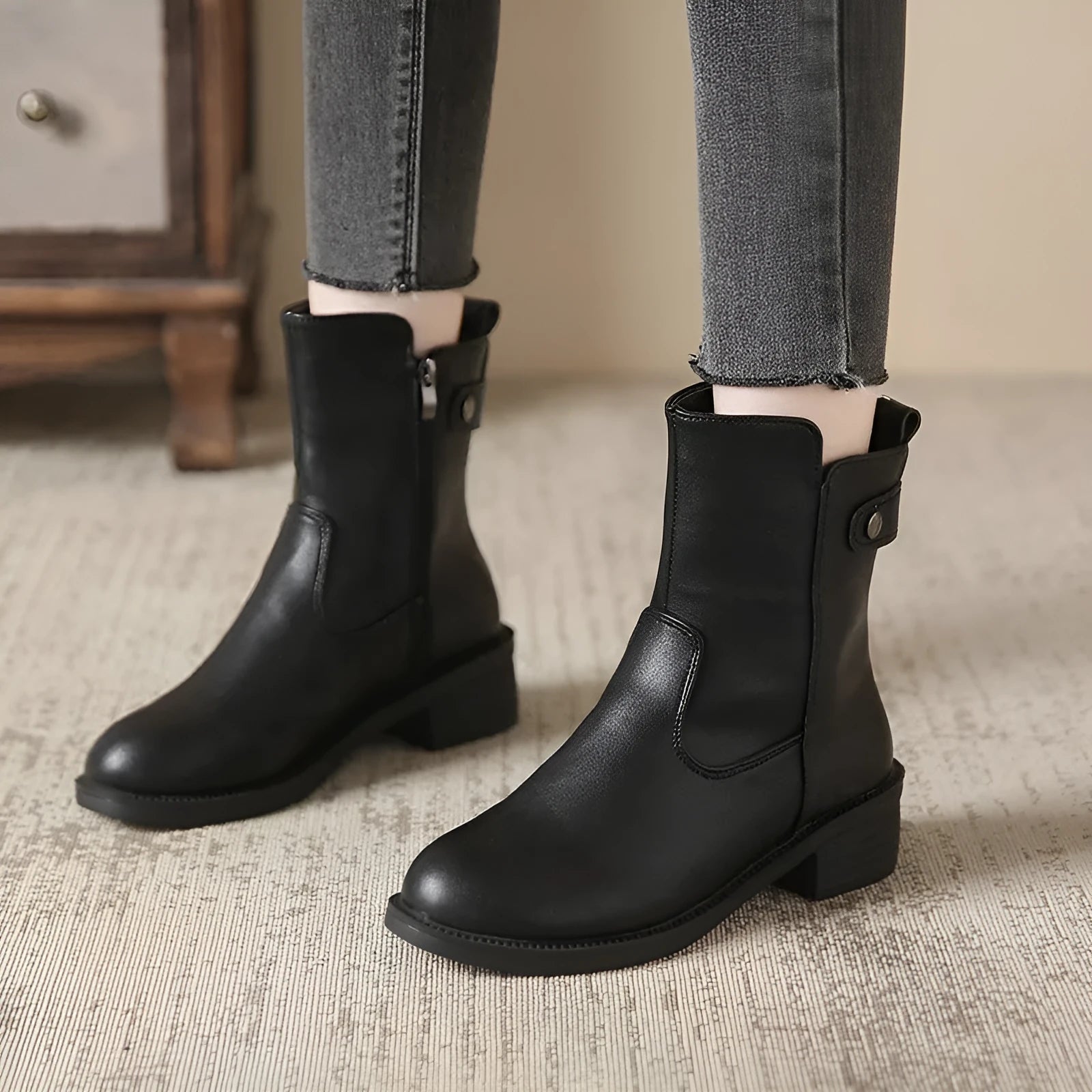 Black women's short boots with side zipper and low heel