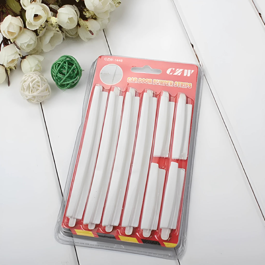 White plastic car door edge protection bumper strip set on a clean background