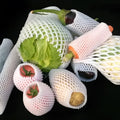 White foam fruit net cover shown with size options for shockproof fruit protection