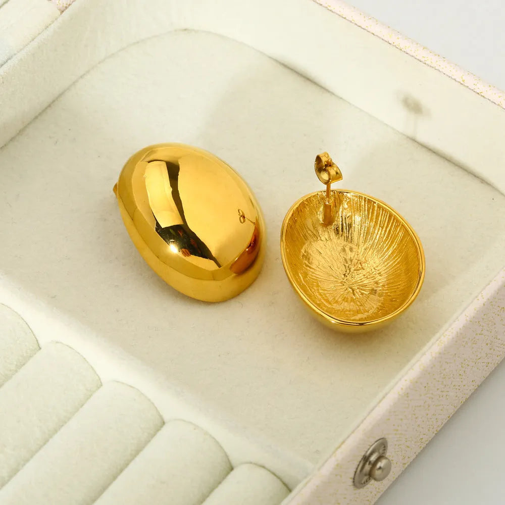 Geometric stainless steel ear studs with gold plating and glazed surface in DFE139 colour