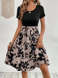 Women's casual dress with lace-up detail and plant printing pattern in A-line silhouette