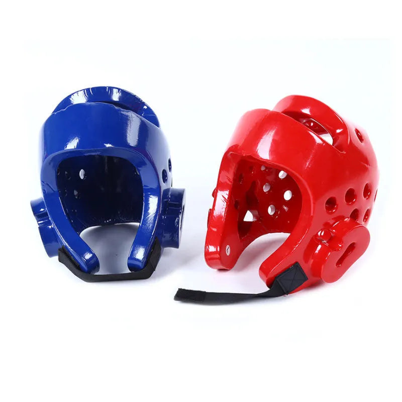 Karate and taekwondo protective gear set with red leg guards, helmet, and boxing gloves