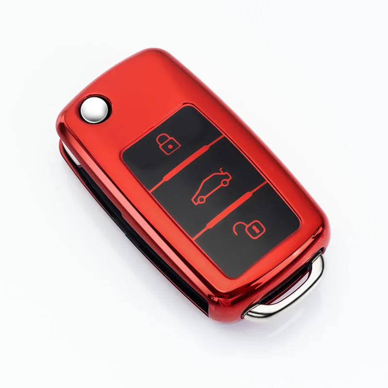 Volkswagen Model A folding key case in TPU material showing four colour options: silver, blue, pink, and red