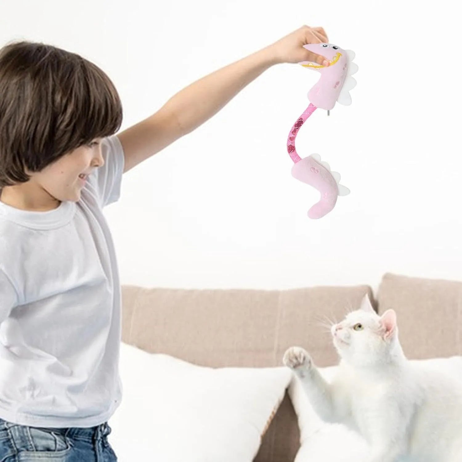 Four-piece cat toy bundle showing chew toy, plush mouse, fish, and bunny in pink, purple, and yellow colours.