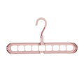 Plastic clothes hanger with a rotating hook in assorted colours on a white background.