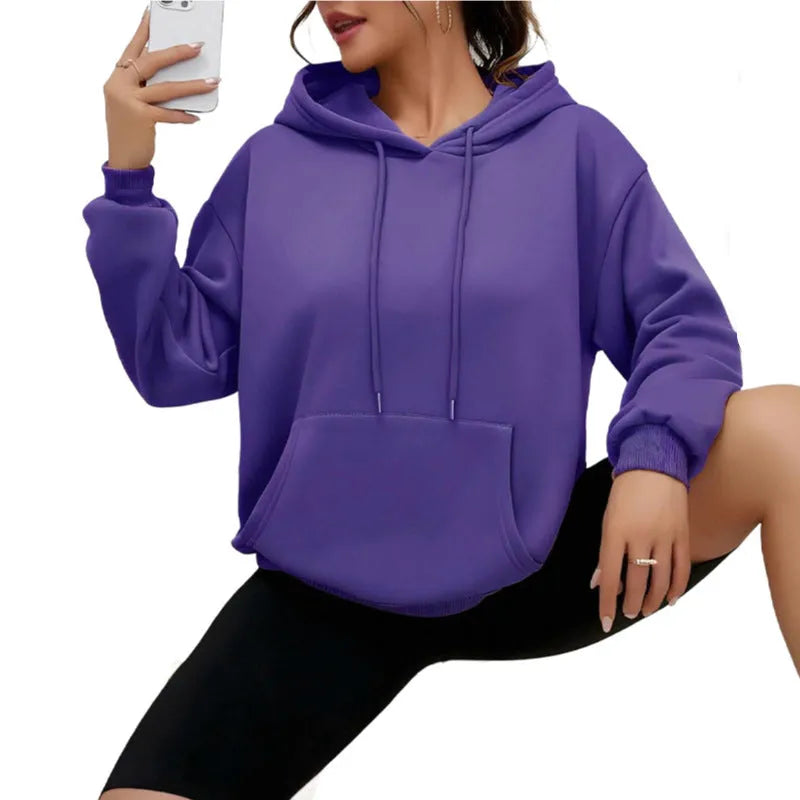 Women's loose grey drawstring hoodie sweatshirt with front kangaroo pocket