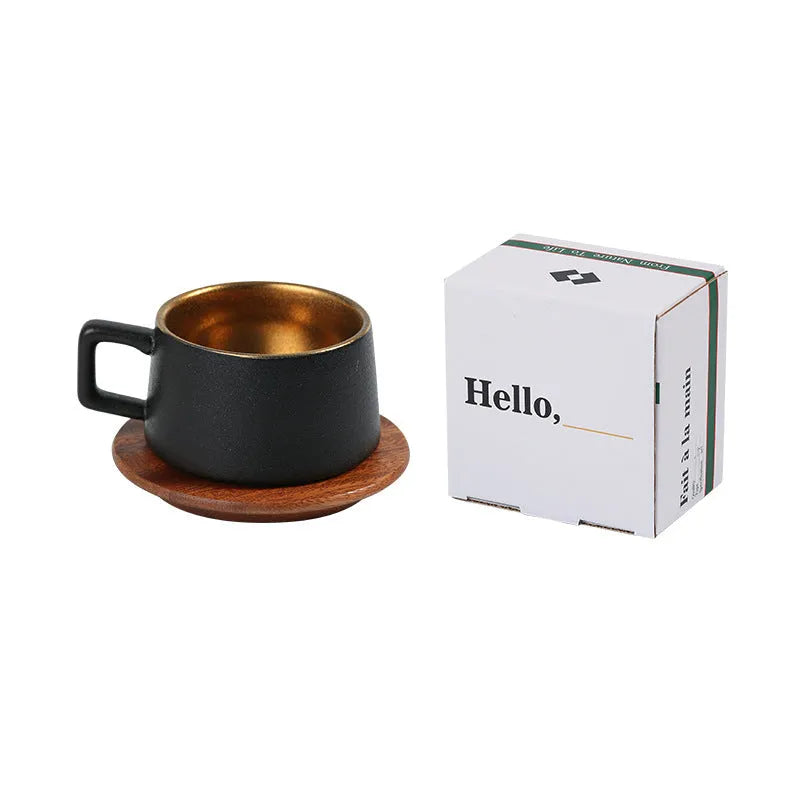 Gold and silver plated gift box next to a 250ml solid colour coffee travel mug.