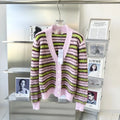 Pink women's wool cardigan sweater in Haima lazy coat style, shown as both a round neck pullover and an open cardigan.