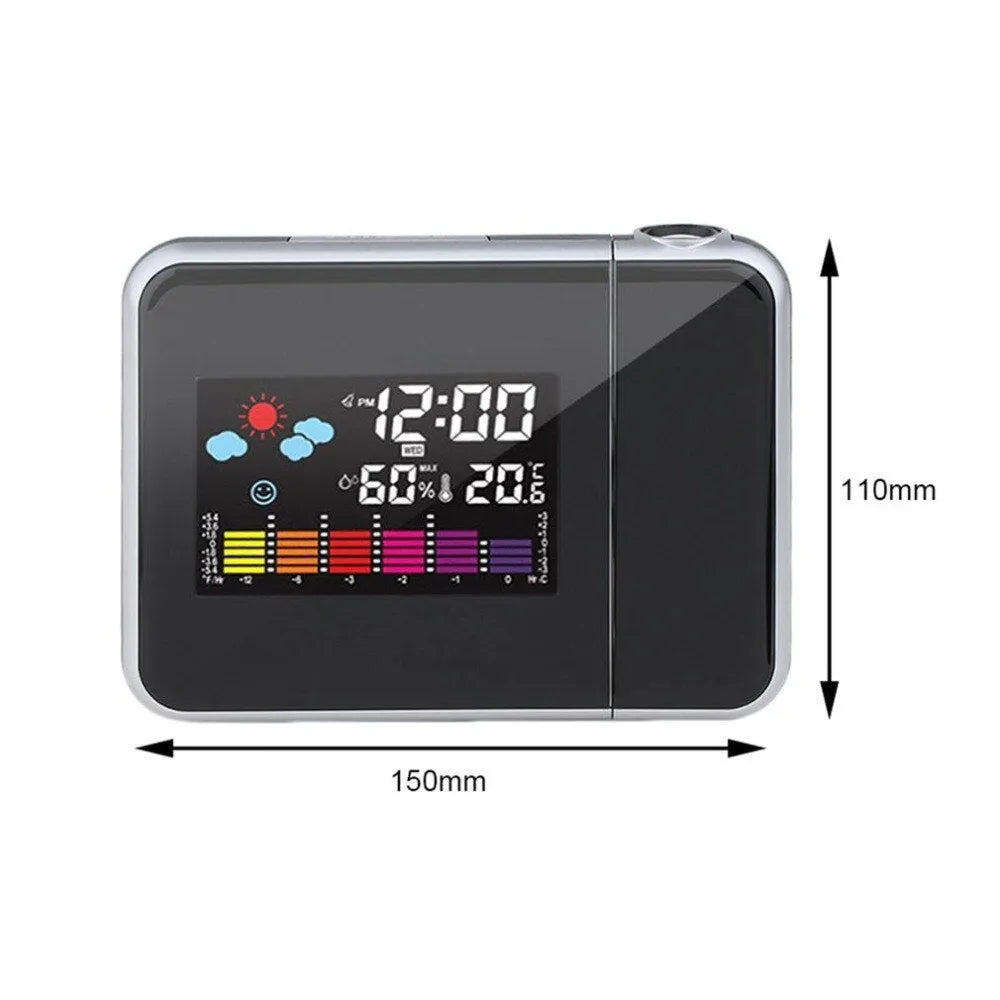 Black digital projection alarm clock with temperature and humidity display on bedside table