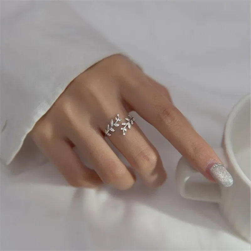Women's copper electroplated leaf branch fashion ring in gold or silver geometric design