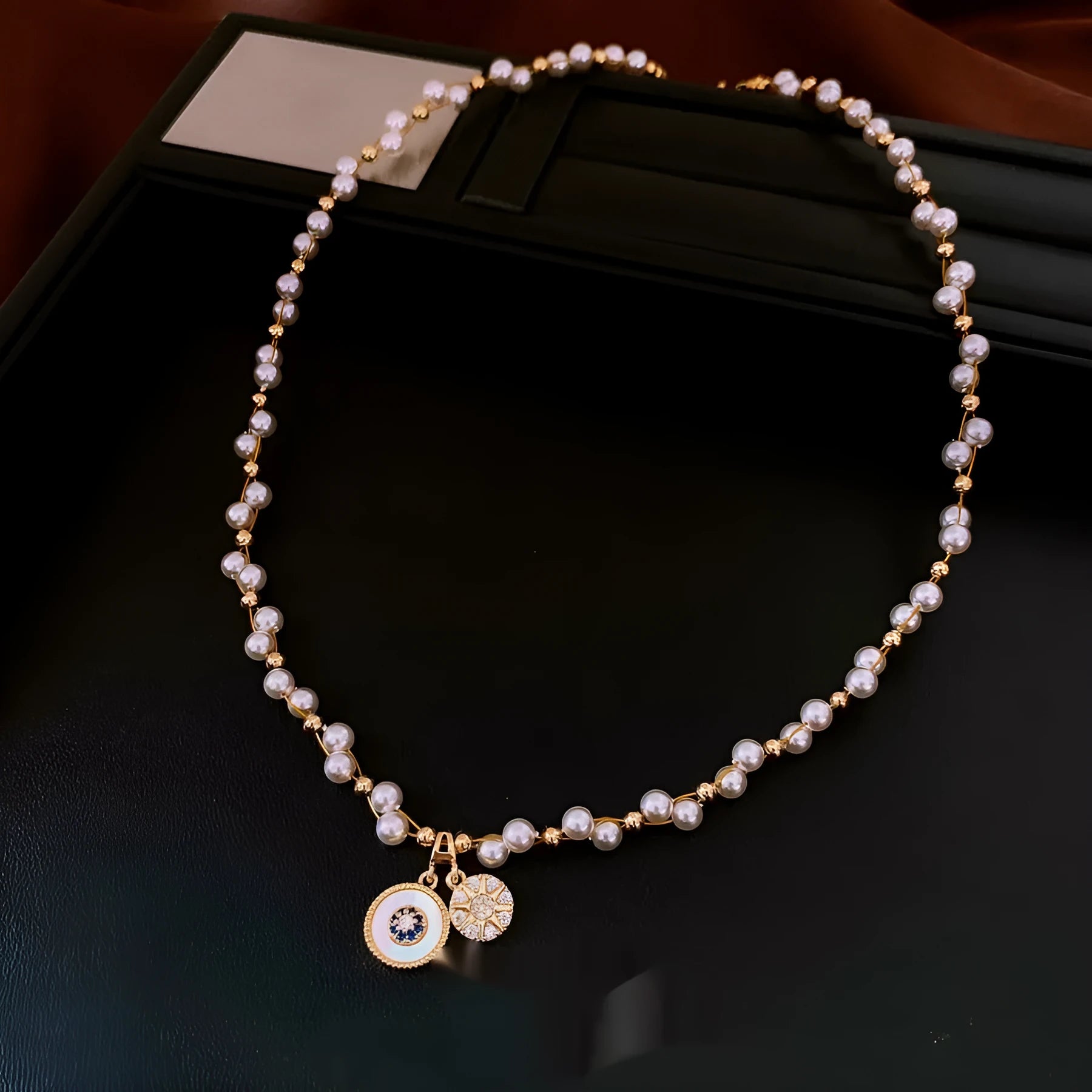 Gold electroplated zircon pearl pendant necklace on adjustable clavicle chain